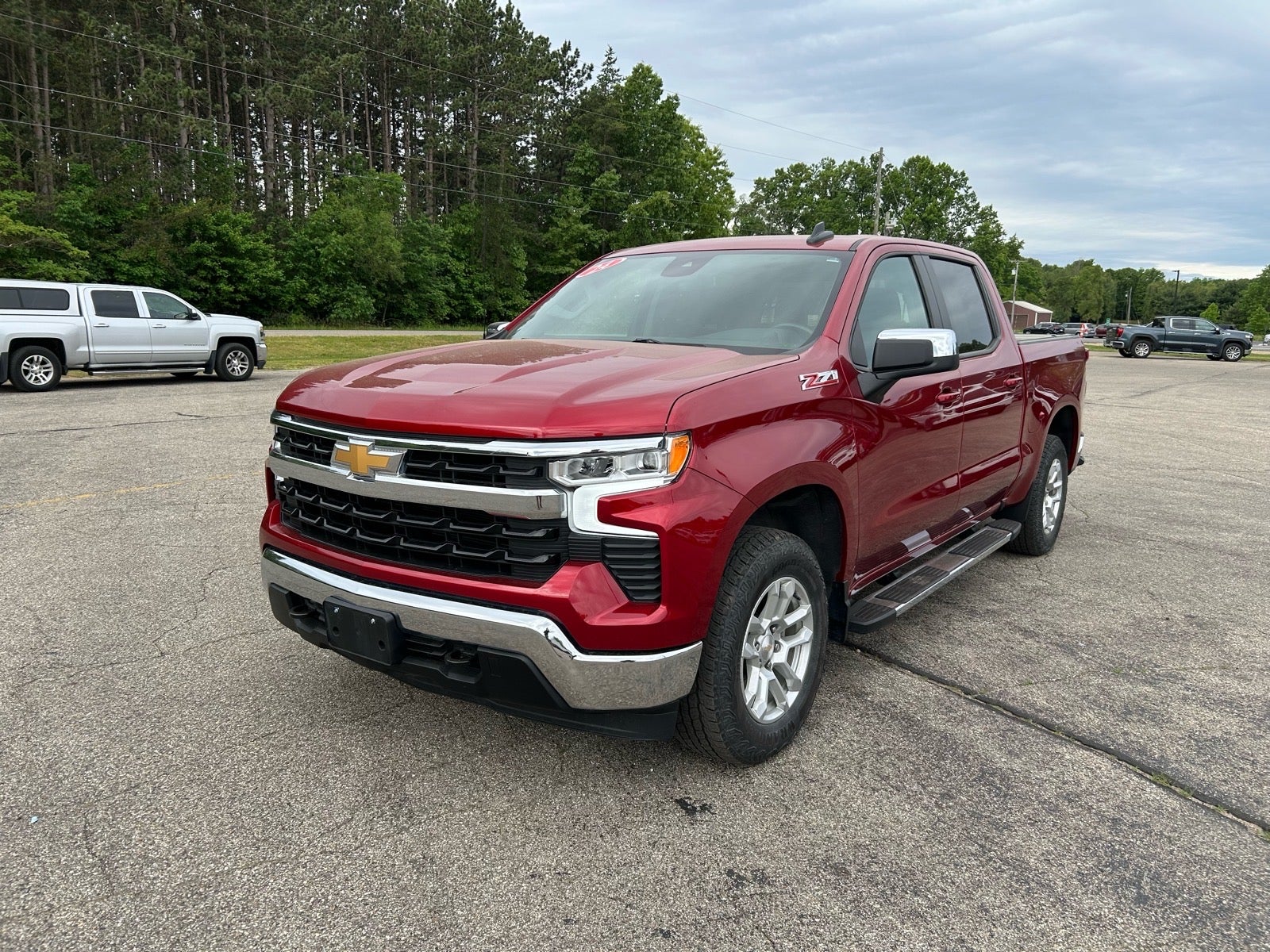 2024 Chevrolet Silverado 1500 LT in Radiant Red Tintcoat — front three-quarter view