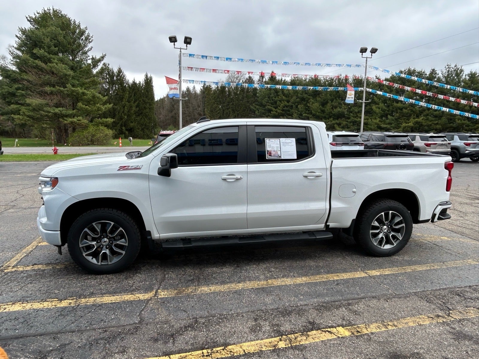 2022 Chevrolet Silverado 1500 RST in Summit White — front three-quarter view