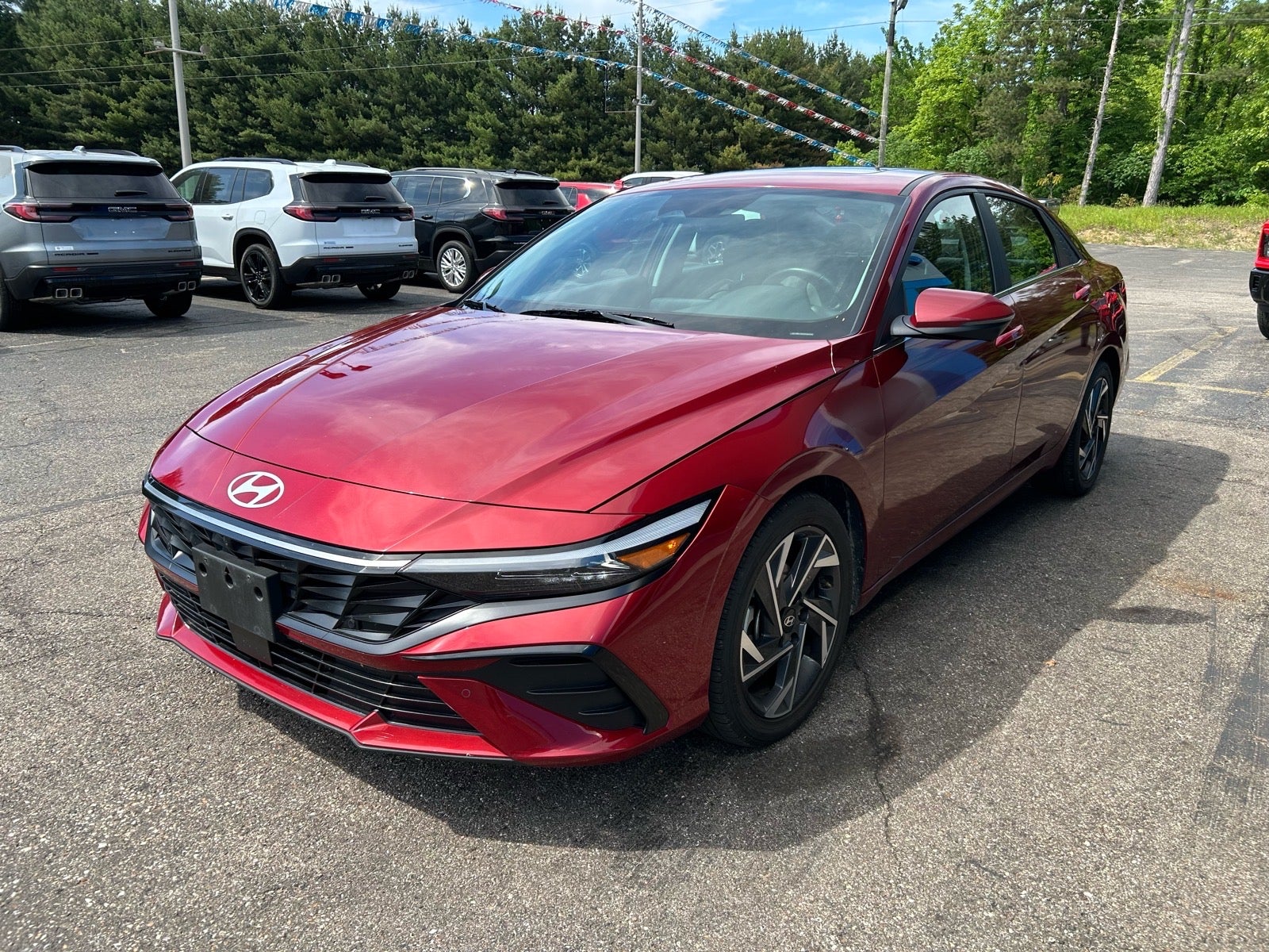 2024 Hyundai Elantra Limited in Red — front three-quarter view